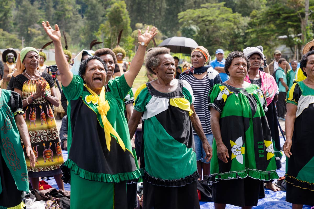 Enga women worshipping at the New Testament dedication.